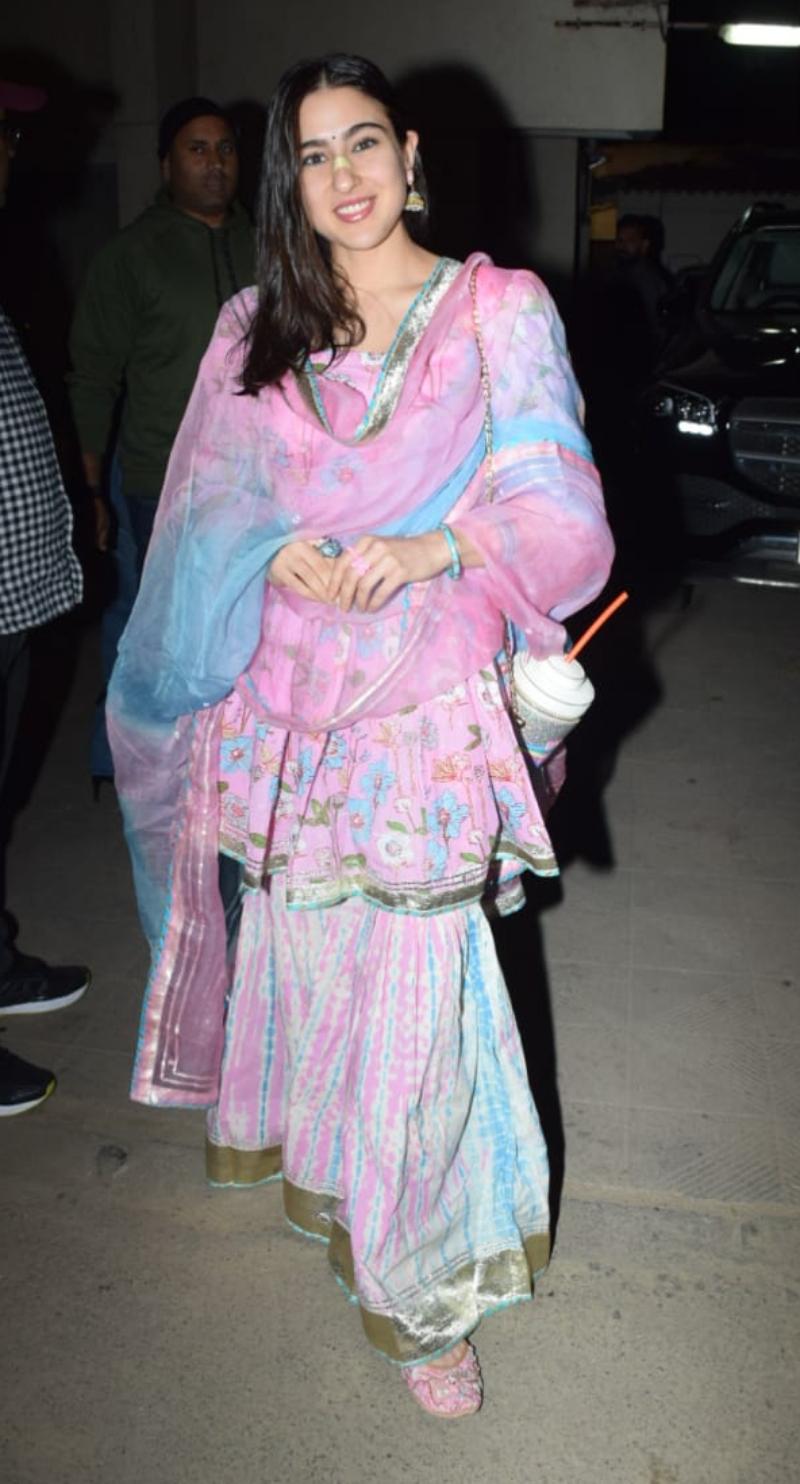 Unlike Janhvi, the 'Atrangi Re' star Sara Ali Khan chose to go desi and arrived wearing a pink and blue printed sharara. Looking pretty as always, the actor rounded-off her ethnic look with beautiful pink mojaris.